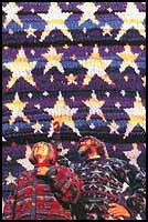 A Philosopher’s Wool cardigan in a star pattern