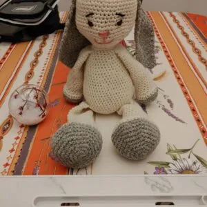 A small hand-knit wool rabbit