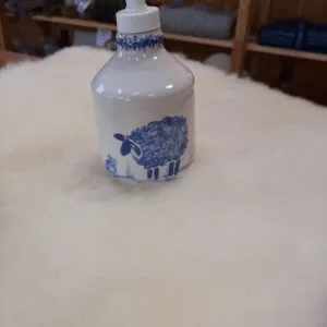 A wool-covered soap pump